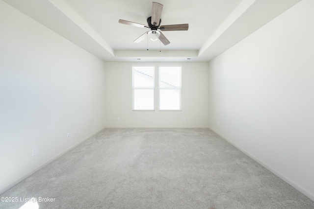 3611 Fordham Pk Dr, Louisville, KY 40245 - unfurnished room featuring a ceiling fan, a raised ceiling, carpet floors, and baseboards