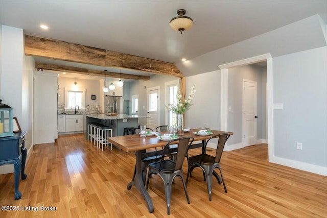 306 E Washington St, La Grange, KY 40031 - dining space with light wood-type flooring, baseboards, recessed lighting, and a healthy amount of sunlight