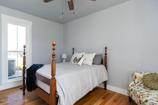 306 E Washington St, La Grange, KY 40031 - bedroom with wood finished floors, a ceiling fan, and baseboards