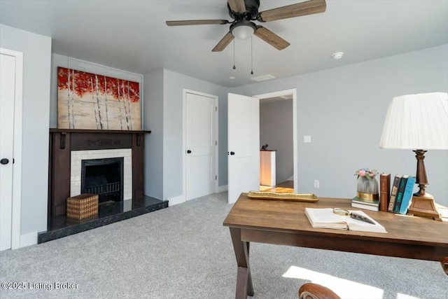 306 E Washington St, La Grange, KY 40031 - carpeted home office with a brick fireplace, baseboards, ceiling fan, and visible vents