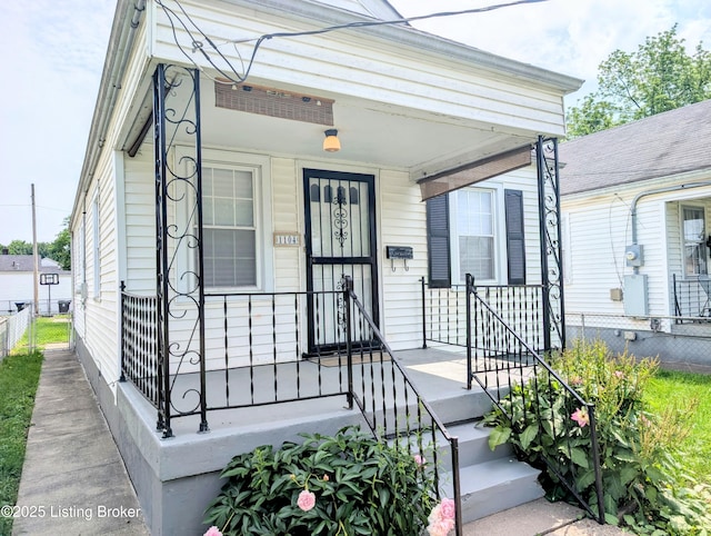 1104 Oleanda Ave, Louisville, KY 40215 - doorway to property featuring fence and covered porch