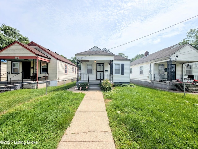 1104 Oleanda Ave, Louisville, KY 40215 - shotgun-style home featuring a porch