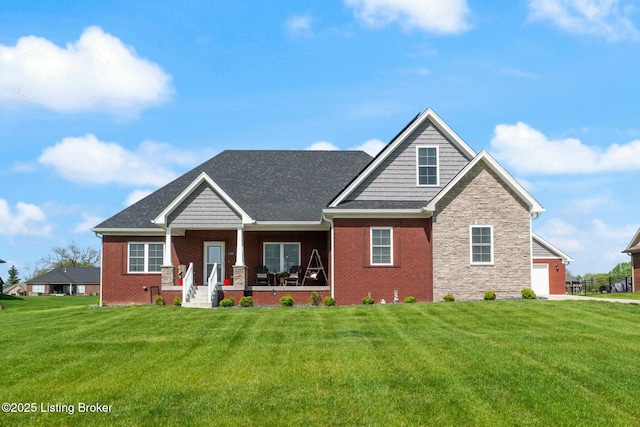 craftsman inspired home with brick siding, stone siding, a porch, and a front yard