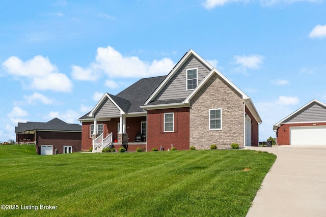 craftsman-style house featuring a garage, stone siding, a front yard, and covered porch
