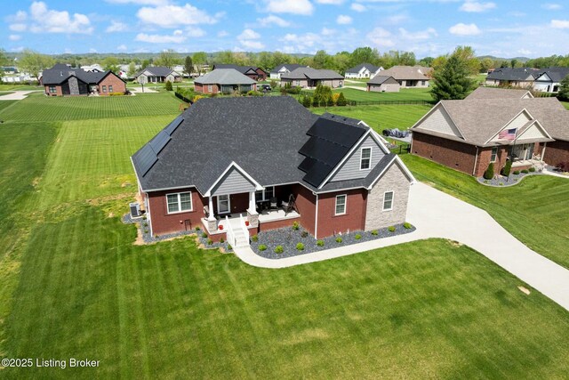 drone / aerial view with a residential view