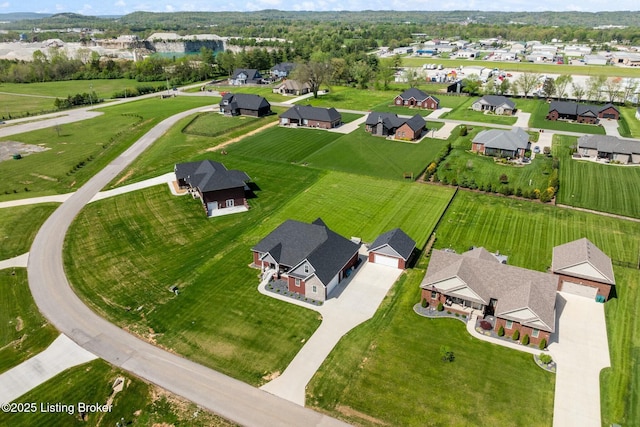 birds eye view of property with a residential view