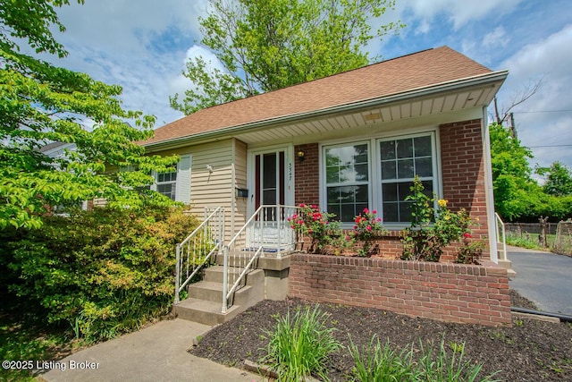 3547 Kings Hwy, Louisville, KY 40220 - ranch-style house with brick siding, fence, and a shingled roof