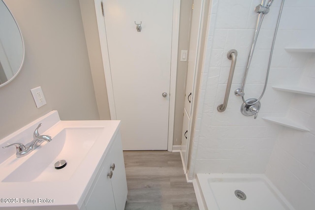 3547 Kings Hwy, Louisville, KY 40220 - full bath featuring vanity, wood finished floors, and a stall shower