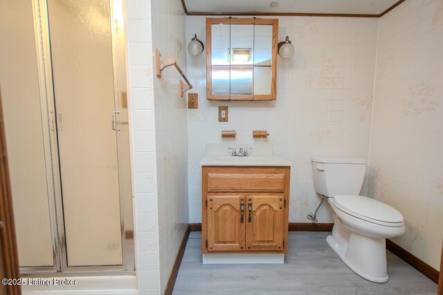 3547 Kings Hwy, Louisville, KY 40220 - full bathroom with a shower stall, wood finished floors, toilet, and vanity