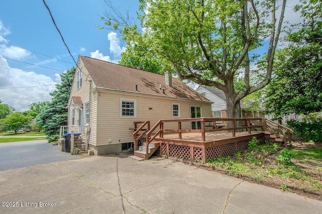 3547 Kings Hwy, Louisville, KY 40220 - back of property featuring a wooden deck, a patio, and roof with shingles