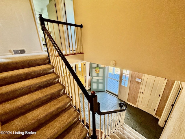 608 Lincoln Park Rd, Springfield, KY 40069 - staircase with visible vents and baseboards