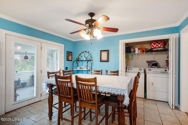 dining room featuring separate washer and dryer, ornamental molding, ceiling fan, and light tile patterned floors