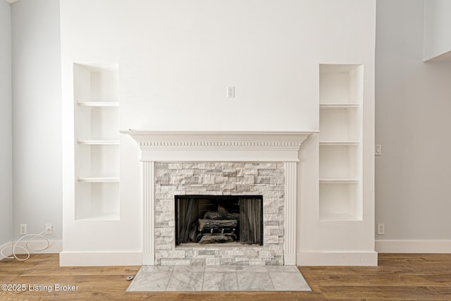 9003 Holly Village Ct, Lyndon, KY 40242 - room details with a fireplace with flush hearth, wood finished floors, built in features, and baseboards