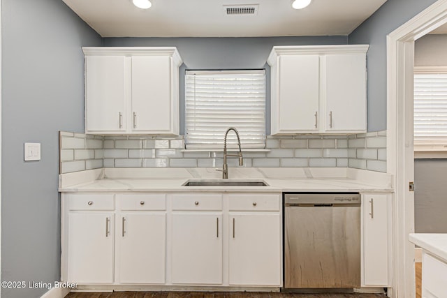 9003 Holly Village Ct, Lyndon, KY 40242 - kitchen with dishwasher, visible vents, white cabinetry, and a sink