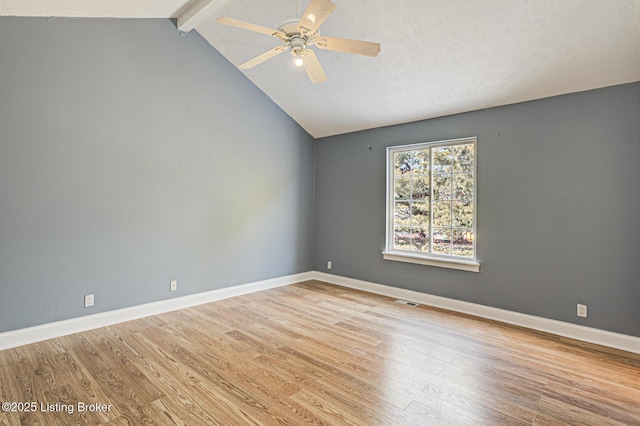 9003 Holly Village Ct, Lyndon, KY 40242 - empty room featuring baseboards, wood finished floors, lofted ceiling with beams, and ceiling fan