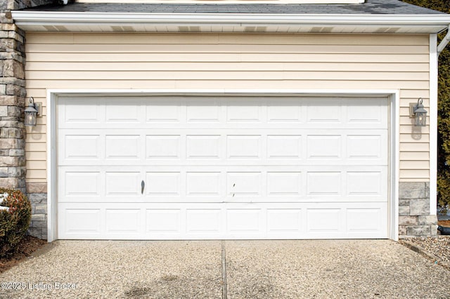 9003 Holly Village Ct, Lyndon, KY 40242 - garage featuring concrete driveway