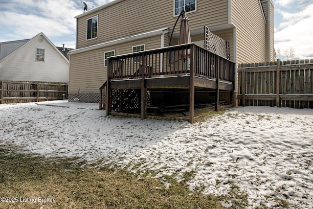 9003 Holly Village Ct, Lyndon, KY 40242 - snow covered house with a fenced backyard and a deck