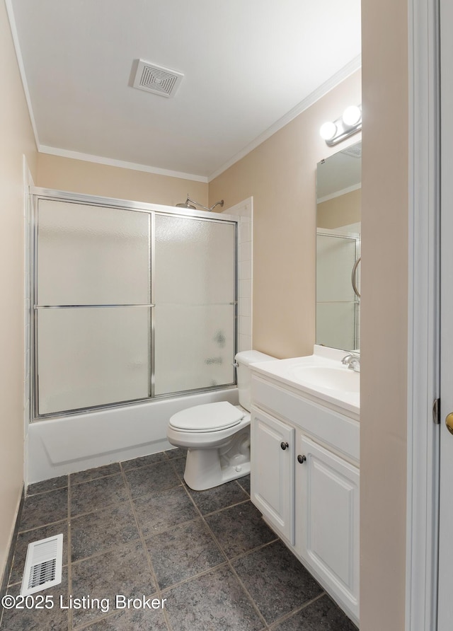 full bath with visible vents, vanity, and ornamental molding