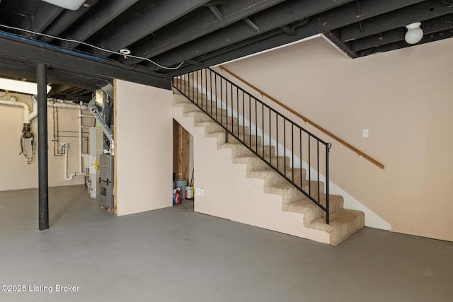 finished basement featuring stairs