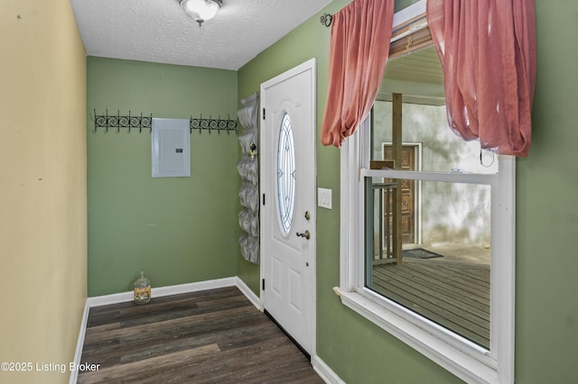1782 Happy Hollow Rd, Clermont, KY 40110 - foyer featuring electric panel, wood finished floors, baseboards, and a textured ceiling