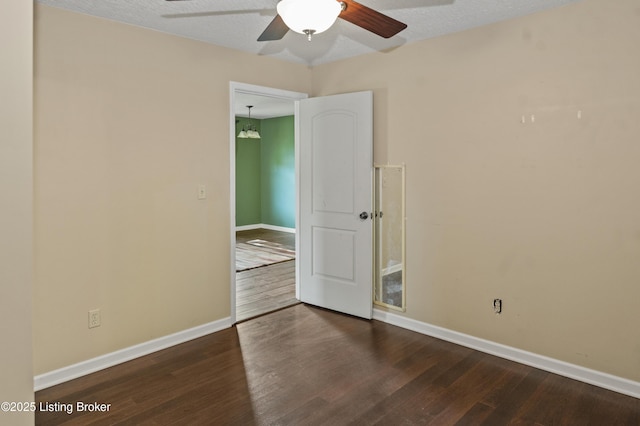 1782 Happy Hollow Rd, Clermont, KY 40110 - empty room with wood finished floors, baseboards, and a ceiling fan
