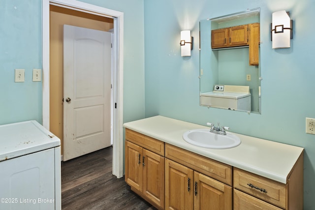 1782 Happy Hollow Rd, Clermont, KY 40110 - bathroom with washer / clothes dryer, wood finished floors, and vanity