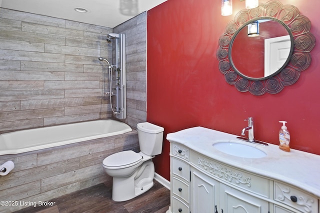 1782 Happy Hollow Rd, Clermont, KY 40110 - bathroom with wood finished floors, toilet, tiled shower / bath, and vanity
