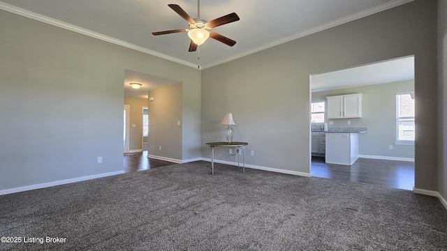 10916 Pheasant Hill Cir, Louisville, KY 40229 - unfurnished room featuring dark carpet, a healthy amount of sunlight, ornamental molding, and ceiling fan