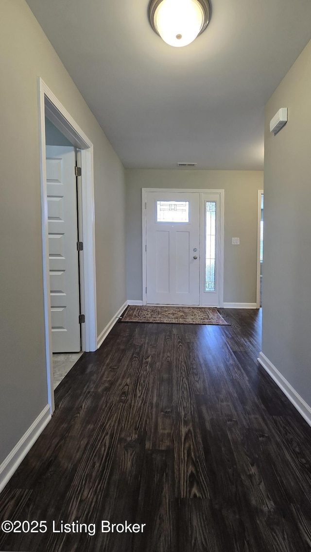 10916 Pheasant Hill Cir, Louisville, KY 40229 - entrance foyer with dark wood-type flooring, visible vents, and baseboards