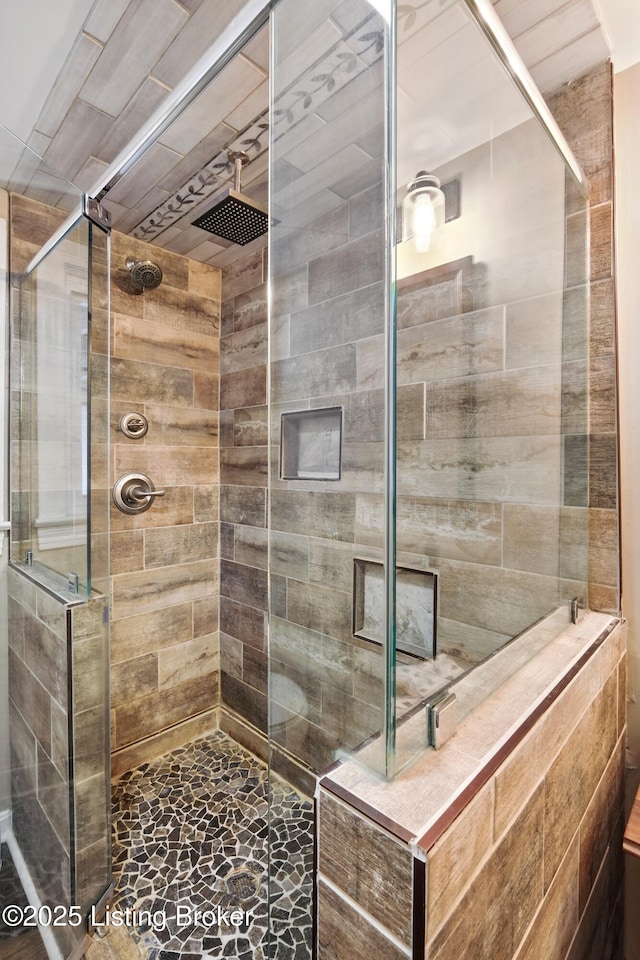 full bathroom with a stall shower
