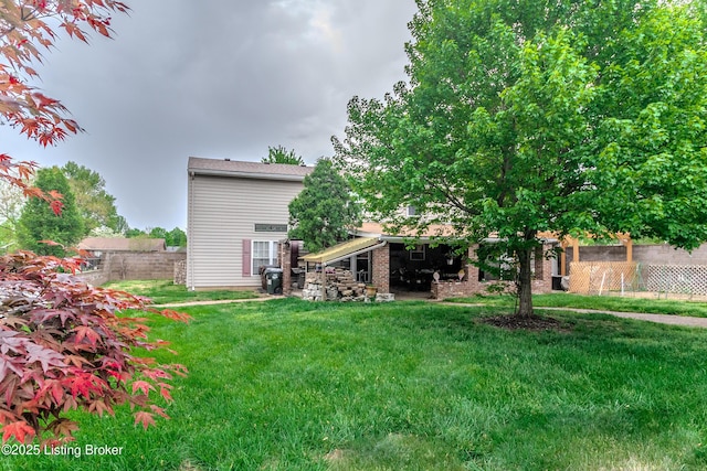 view of yard with fence
