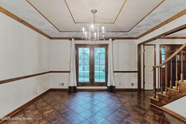 unfurnished dining area with visible vents, a notable chandelier, and baseboards