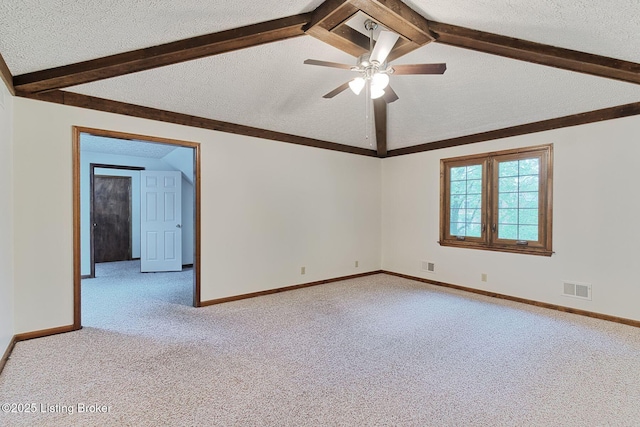 empty room with light colored carpet, visible vents, a ceiling fan, and a textured ceiling
