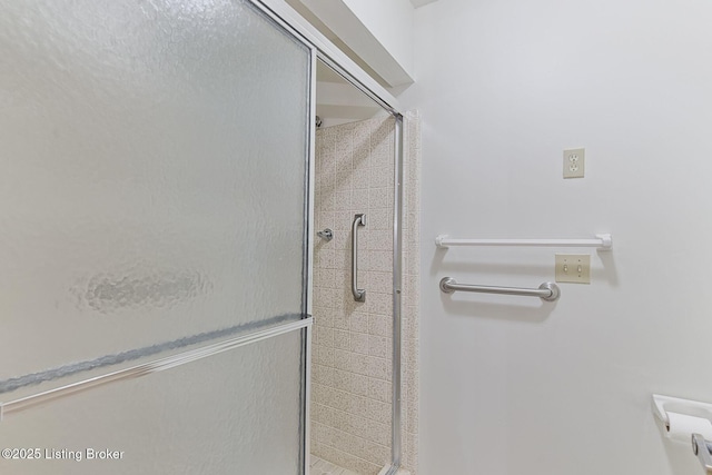 bathroom with a stall shower