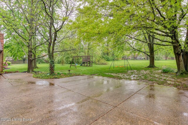 view of patio featuring a playground