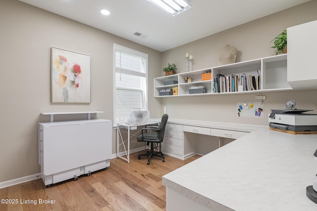 home office with light wood-style floors, recessed lighting, baseboards, and visible vents