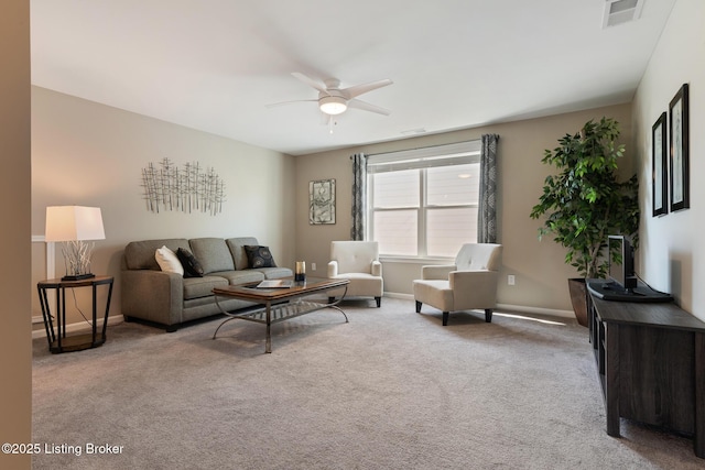 carpeted living room with ceiling fan, visible vents, and baseboards