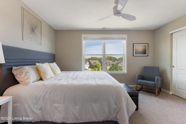 bedroom with baseboards, ceiling fan, carpet, and visible vents