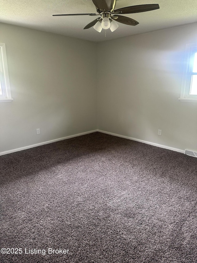 510 S Kentucky St, Irvington, KY 40146 - carpeted empty room featuring baseboards, a ceiling fan, visible vents, and a textured ceiling