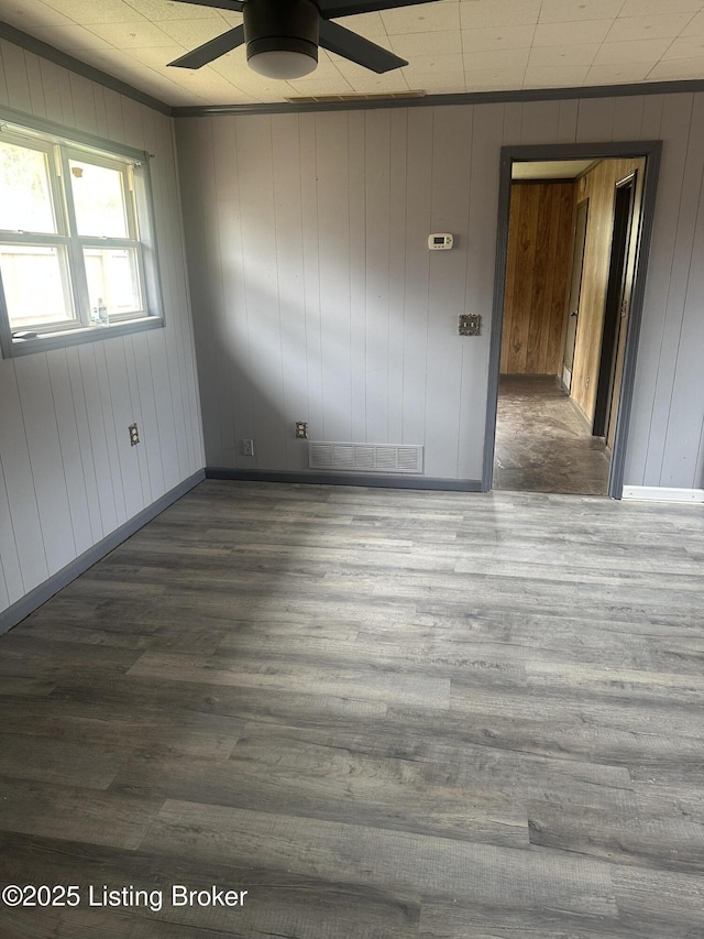 510 S Kentucky St, Irvington, KY 40146 - empty room featuring dark wood finished floors, baseboards, a ceiling fan, and visible vents