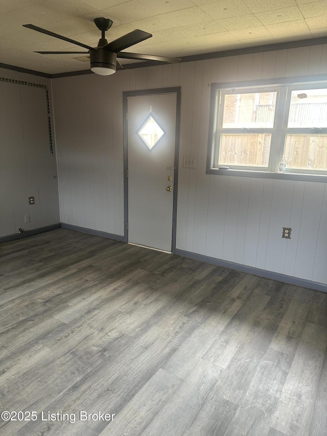 510 S Kentucky St, Irvington, KY 40146 - spare room with baseboards, a ceiling fan, and wood finished floors