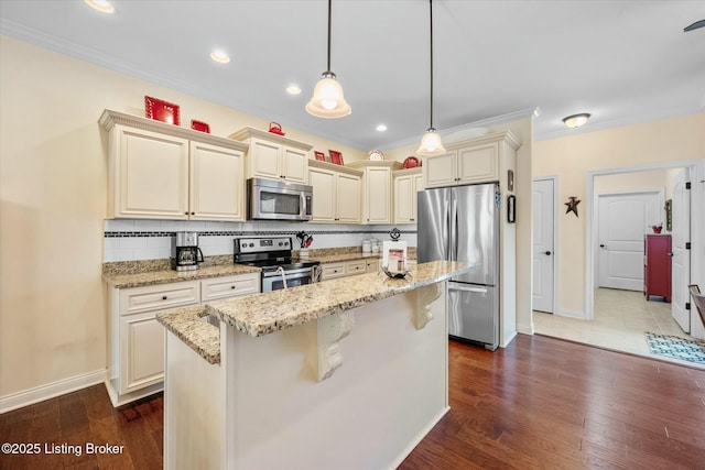kitchen with stainless steel appliances, light stone countertops, crown molding, baseboards, and decorative backsplash
