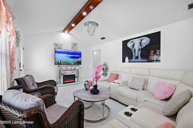 living room featuring visible vents, marble finish floor, lofted ceiling with beams, and wainscoting