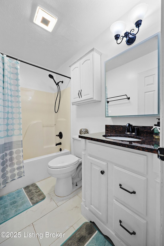 bathroom with vanity, a textured ceiling, toilet, marble finish floor, and shower / bath combination with curtain