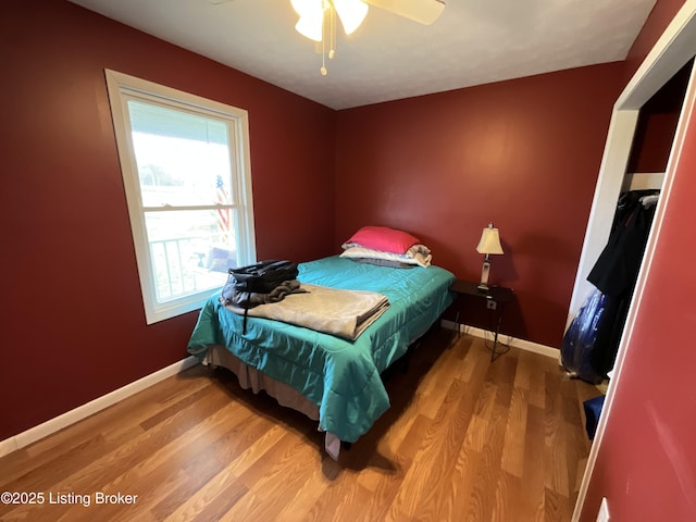 154 Gossom Ln, Milton, KY 40045 - bedroom with baseboards, a ceiling fan, and wood finished floors
