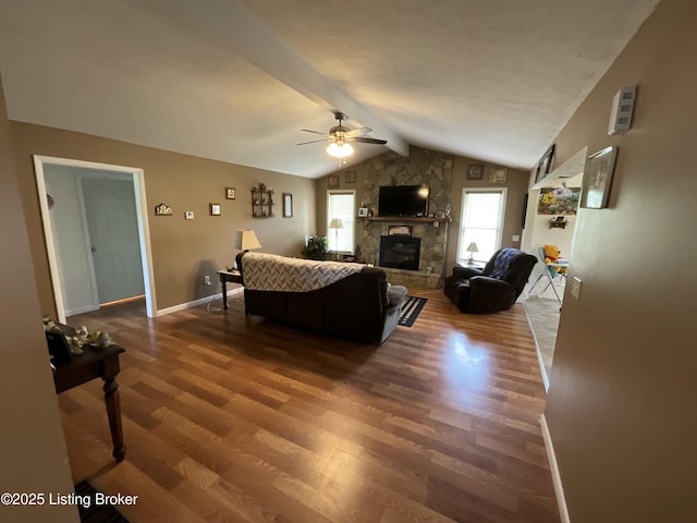154 Gossom Ln, Milton, KY 40045 - living room featuring wood finished floors, a stone fireplace, vaulted ceiling with beams, and ceiling fan