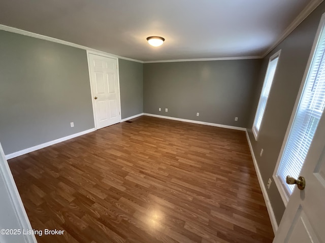 224 Spring Creek Ln, Milton, KY 40045 - unfurnished room with baseboards, dark wood-type flooring, and crown molding