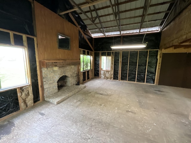 224 Spring Creek Ln, Milton, KY 40045 - unfurnished living room featuring a high ceiling and a fireplace