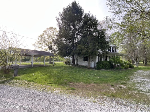 224 Spring Creek Ln, Milton, KY 40045 - view of side of property with gravel driveway and a yard