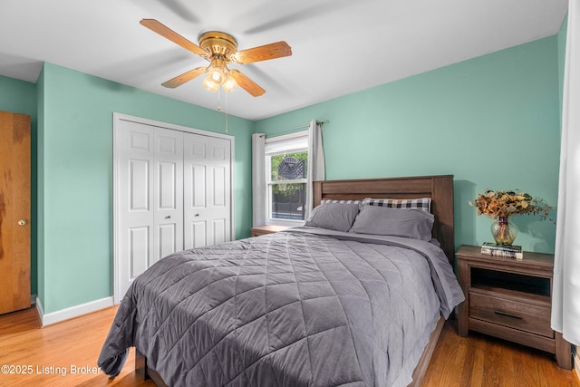 2807 Alice Ave, Louisville, KY 40220 - bedroom with wood finished floors, a closet, baseboards, and ceiling fan